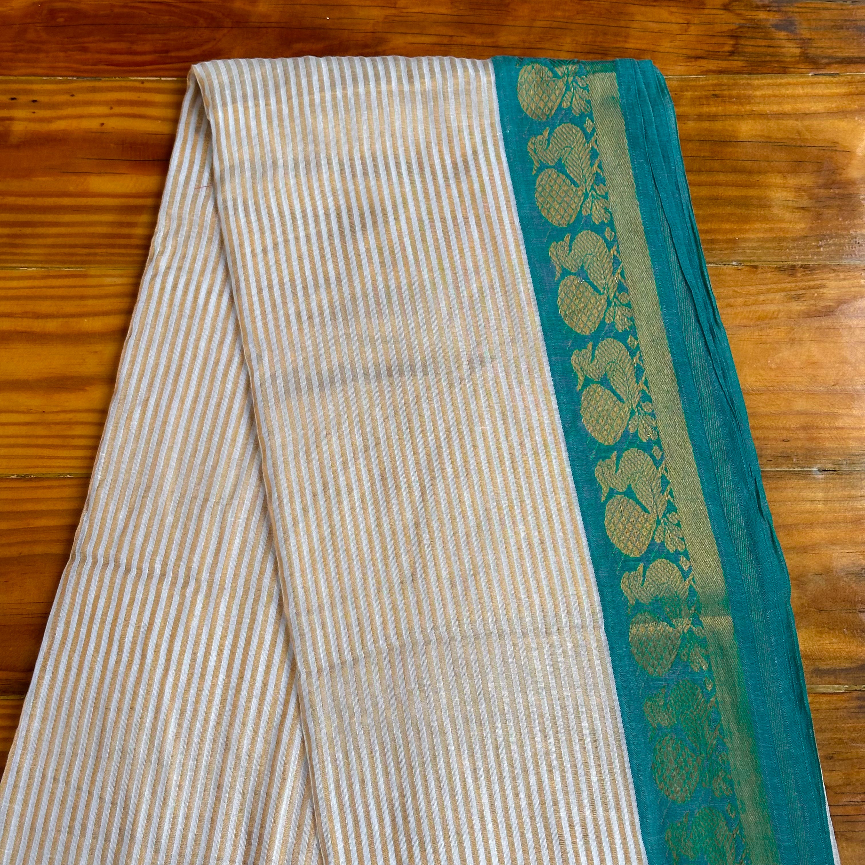 🩵Ivory & Teal Mulcotton Saree with Gold Zari Floral Border & Emerald Tassel Fringe🤍