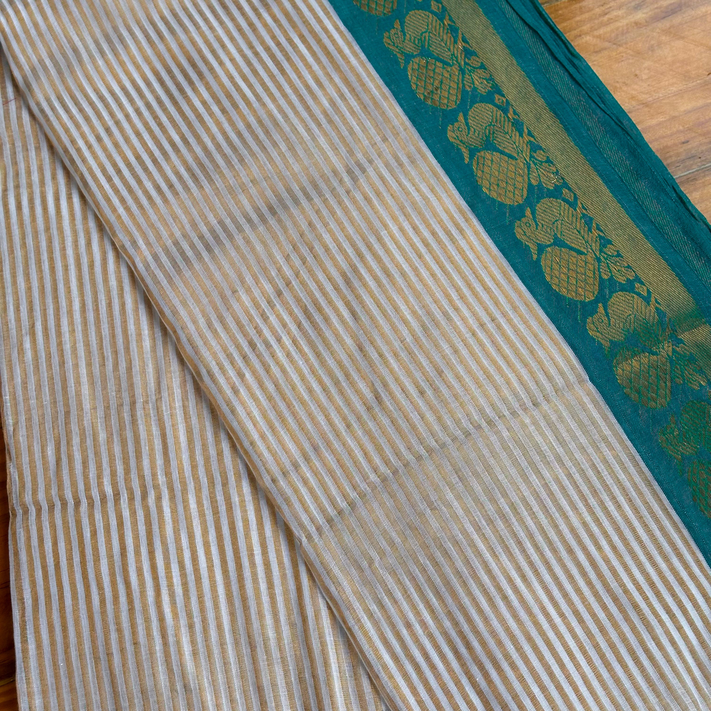 🩵Ivory & Teal Mulcotton Saree with Gold Zari Floral Border & Emerald Tassel Fringe🤍
