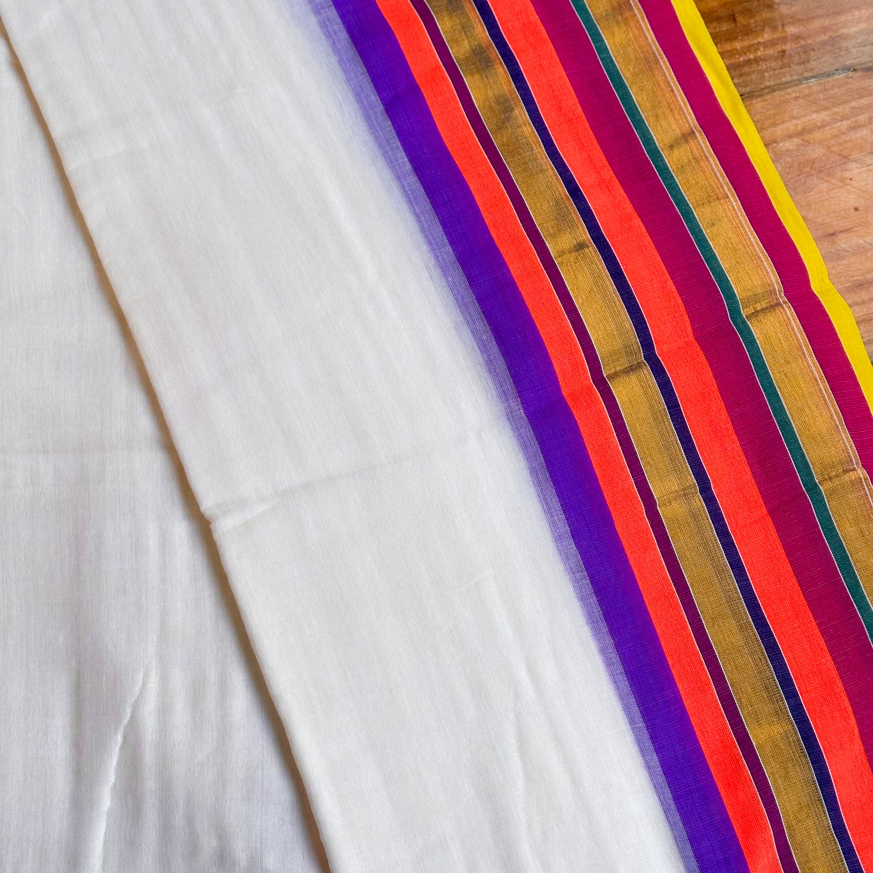 🤍White Mul Chanderi Saree with Rainbow Stripe Pallu & Coral Tassel Border🤍