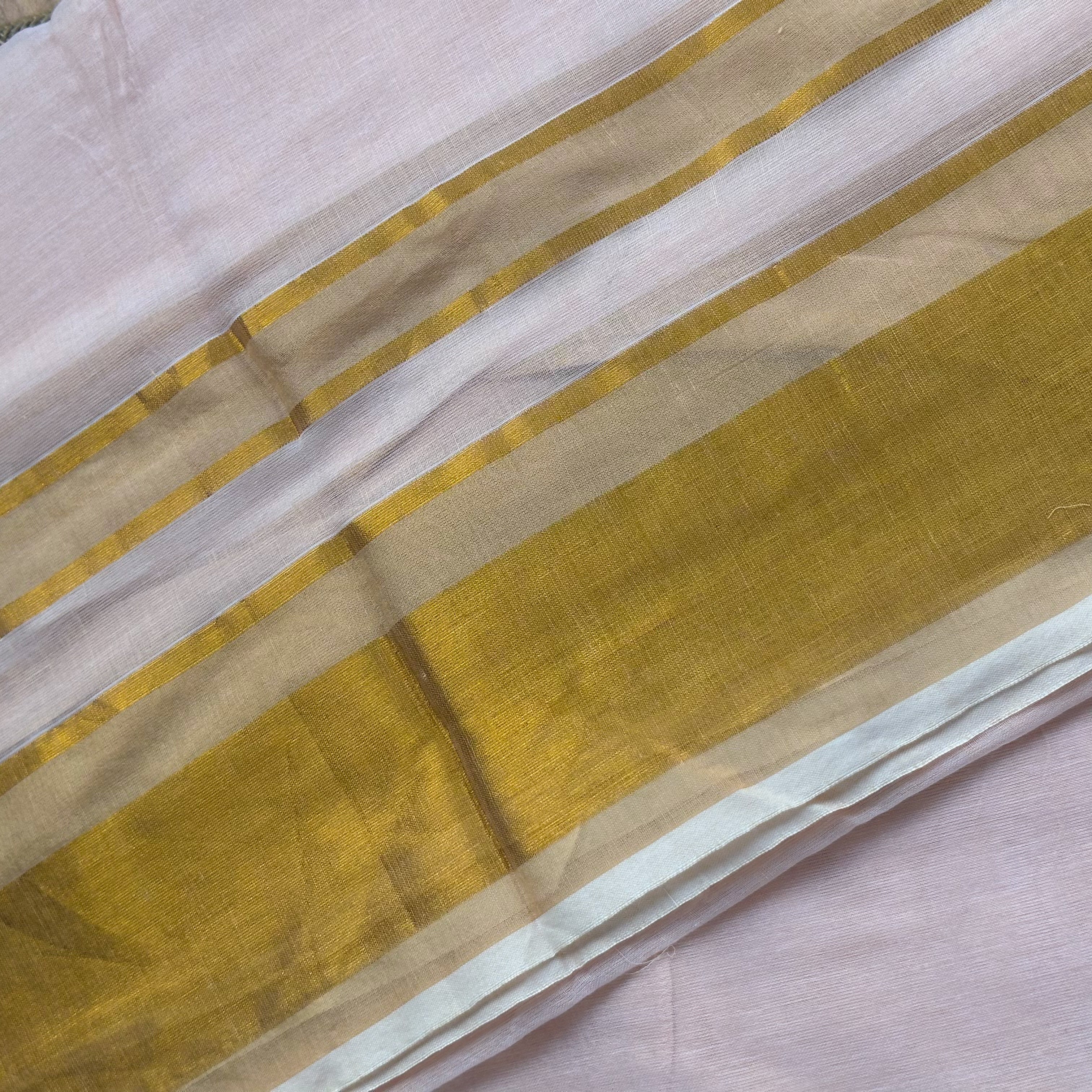 🤍Blush White Mul Cotton Saree with Gold Zari Stripe Border & Natural Tassels🤍