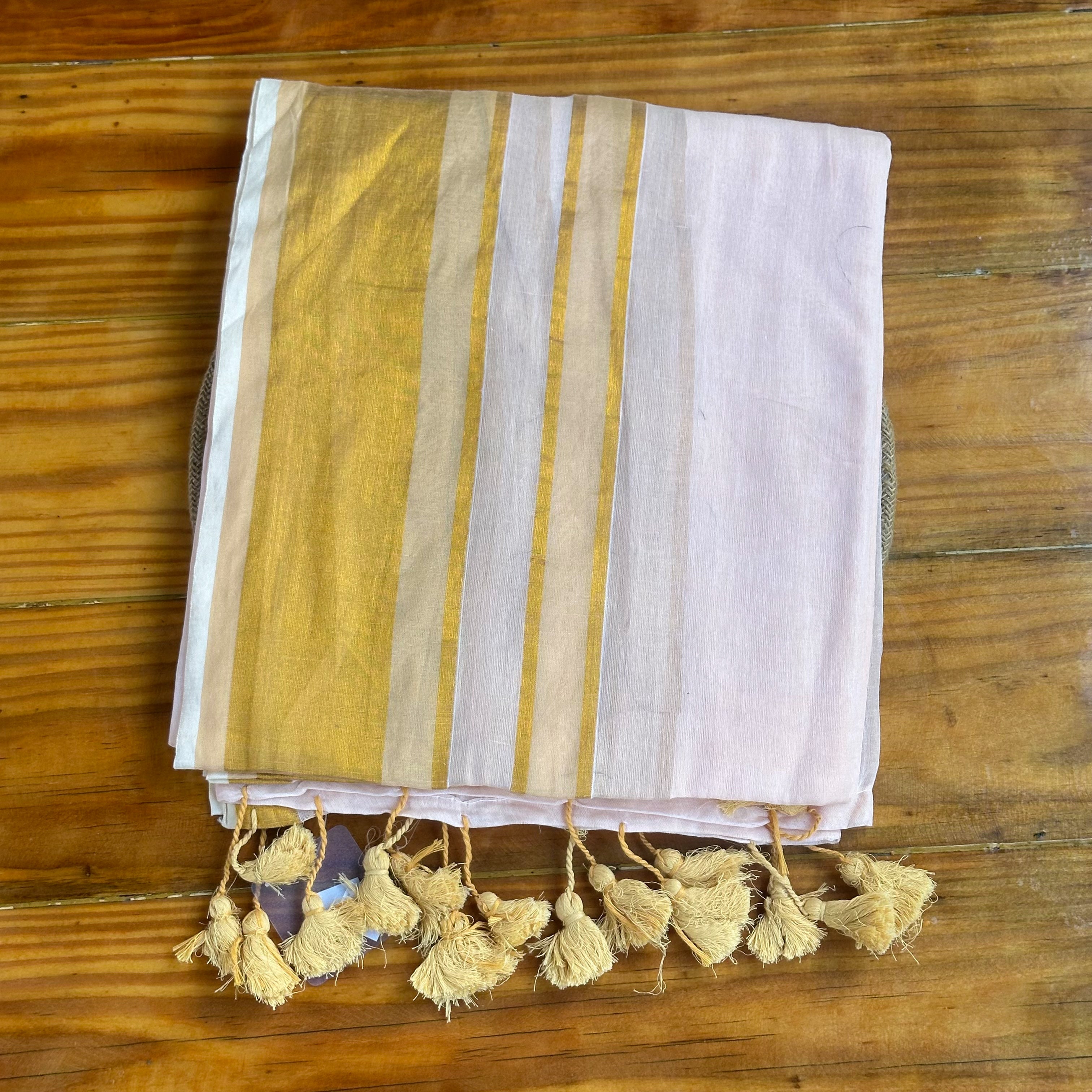 🤍Blush White Mul Cotton Saree with Gold Zari Stripe Border & Natural Tassels🤍