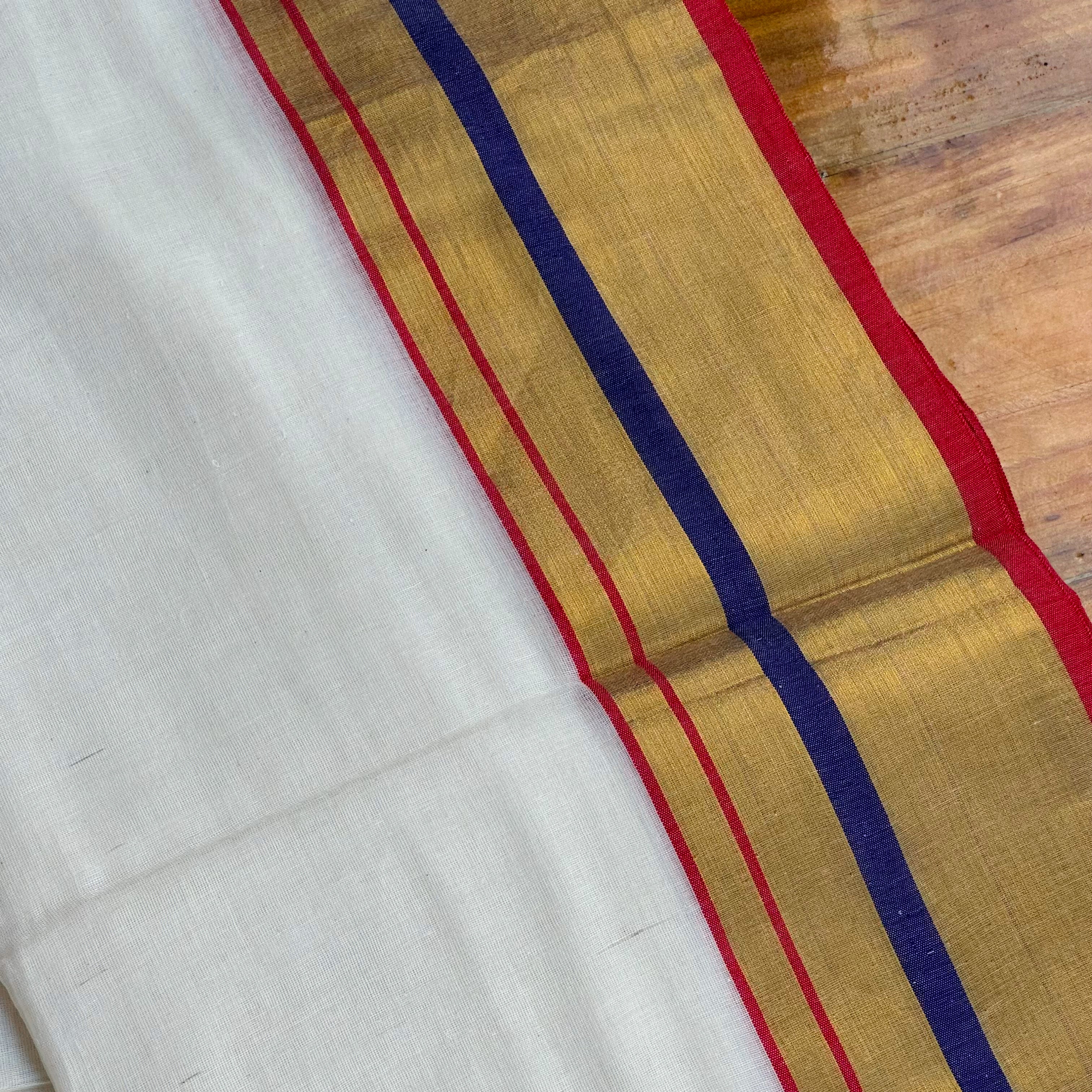 🤍Pristine White & Gold Saree with Royal Blue & Red Stripes and Dual-Tone Tassels🤍