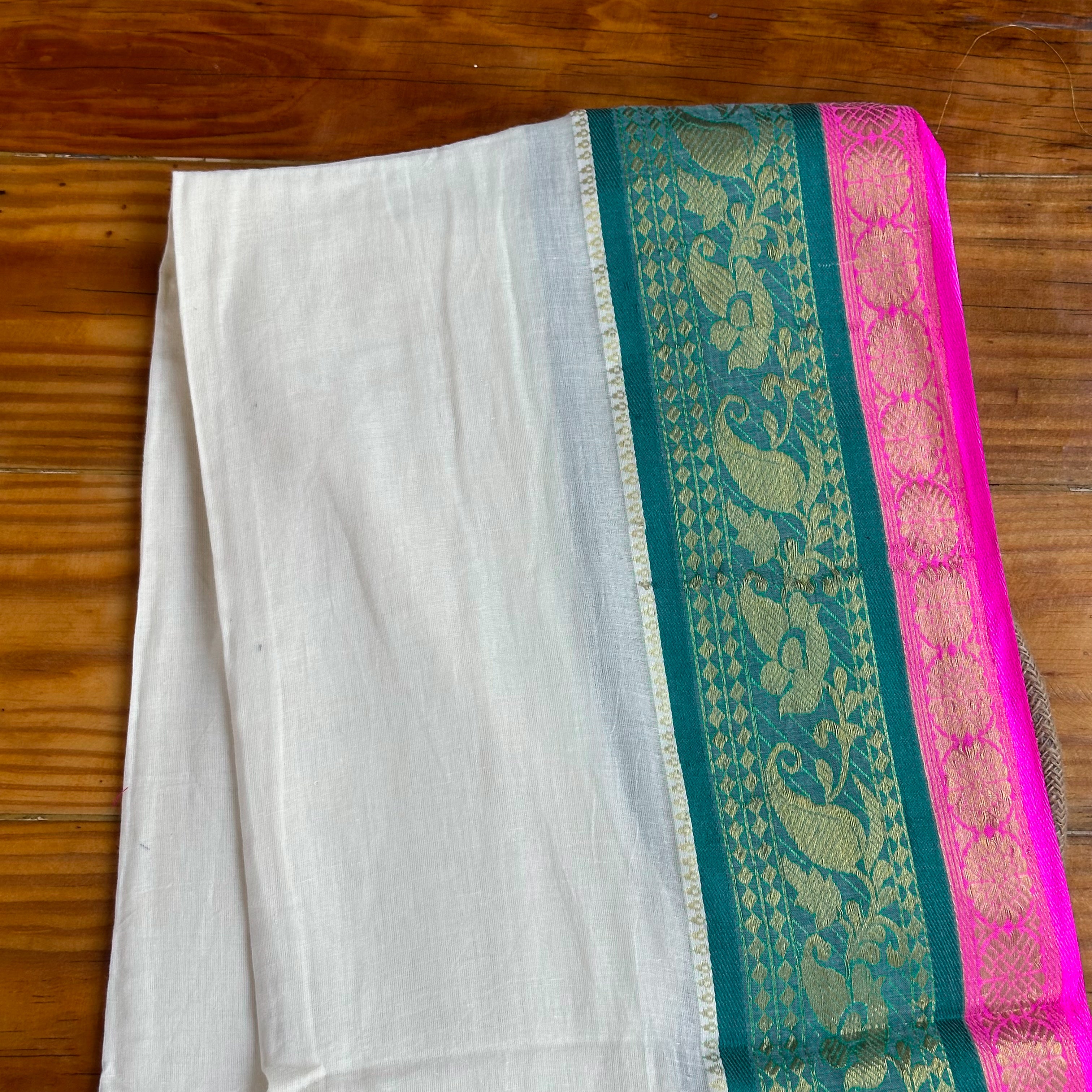 🩷Ivory & Fuchsia Brocade Saree with Teal Zari Border and Dual-Tone Tassels🩷